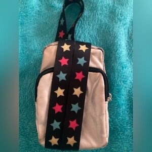 Basically a purse for a phone. It’s polyester and a star strap. The og price 30$